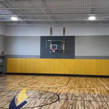 Completed HVAC project inside a basketball gym